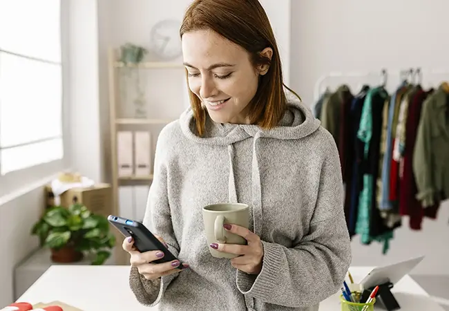 woman checking bank account on phone