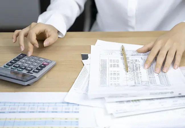 hands with banking papers